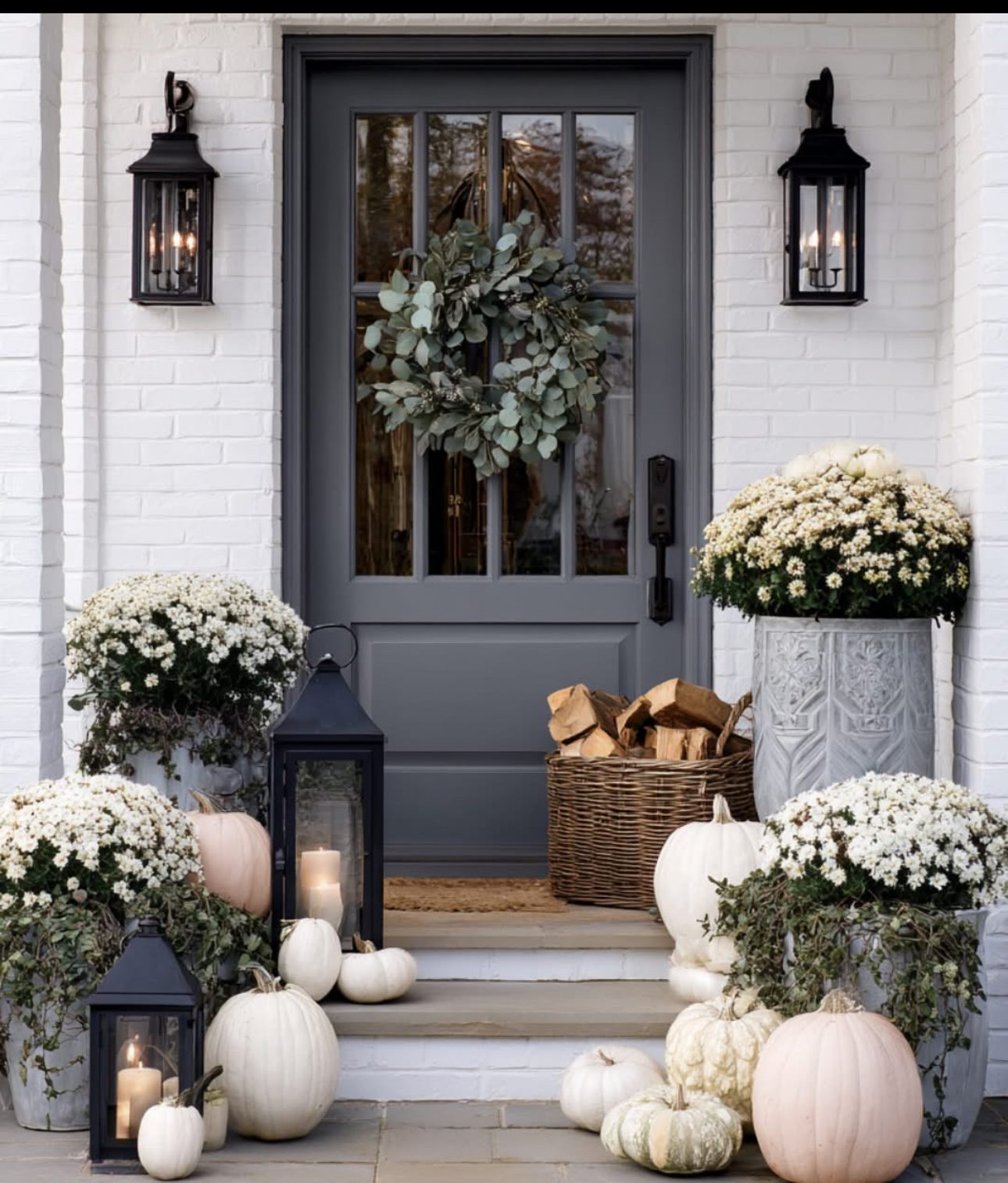 Seasonal front porch styling with mums, pumpkins and lanterns in Nellie Gail Ranch